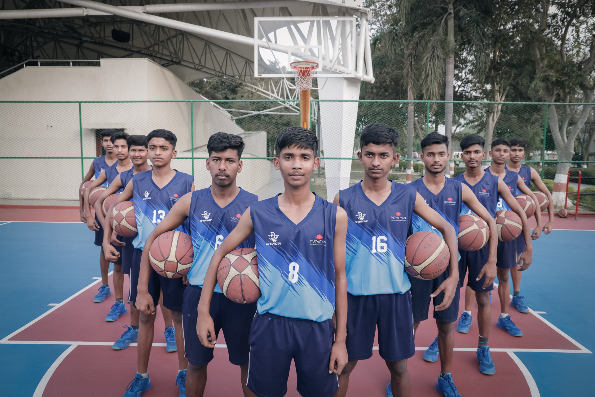 Students with basketballs